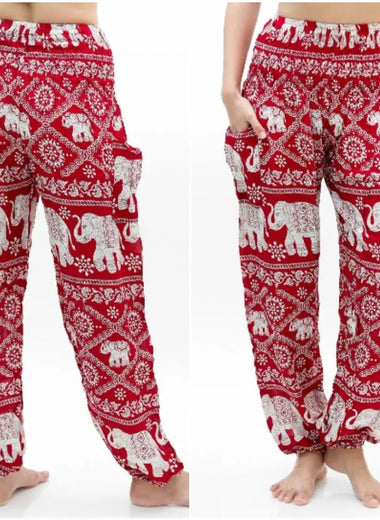 a pair of women's red and white elephant pajama pants