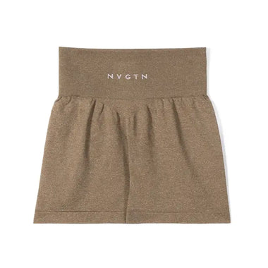 a woman in mint green shorts and a white bra top