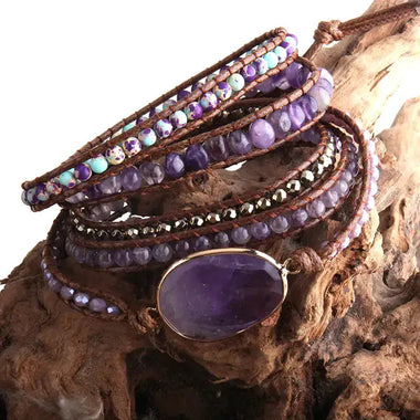 a close up of a stack of bracelets