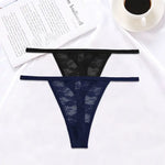 a woman's underwear with a cup of coffee and a book