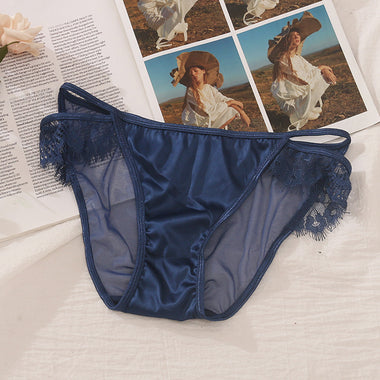 a woman's blue underwear with lace on the bottom