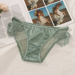 a woman's underwear with a picture of a woman in the background