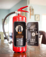 a red fire extinguisher sitting on top of a wooden table