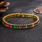 a rainbow colored bracelet on a table