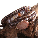 a close up of a stack of bracelets