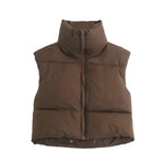 a brown down filled vest on a white background