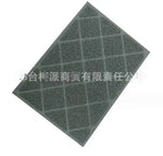 a gray tile with a diamond pattern on it