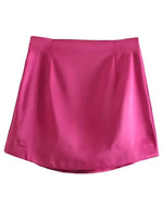 a women's pink skirt on a white background