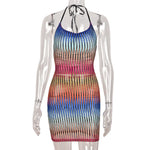 a mannequin wearing a multicolored dress