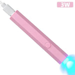 a pink electric toothbrush with a blue light on it