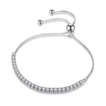 a white gold bracelet with diamonds on a white background