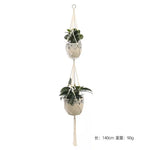 three hanging planters with plants in them