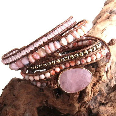 a close up of a stack of bracelets