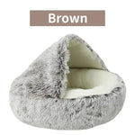 a gray dog bed with a white bottom