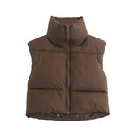 a brown down filled vest with a hood