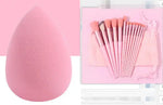 a set of pink makeup brushes next to a pink egg