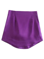 a women's purple skirt with a high waist