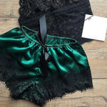 a pair of green and black lingerie shorts