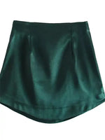 a green leather skirt on a white background