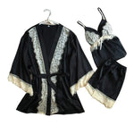 a black robe with white lace on it