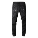 a pair of black jeans on a black background