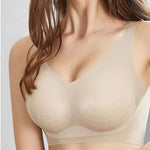 a woman wearing a bra in a beige bra