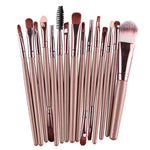 a large set of makeup brushes with a black handle