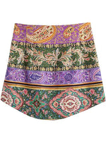 a purple and green paisley print skirt