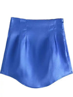 a women's blue skirt on a white background